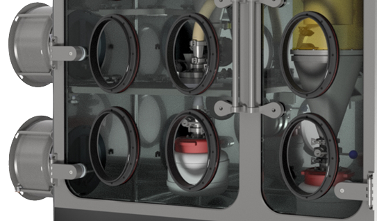 Pharmaceutical isolator with transparent panel, six glove ports, and internal containment mechanisms used in Schedio micronization service.
