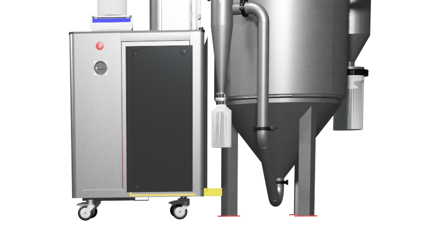 Close-up of spray drying equipment with stainless steel container, control panel on wheels, and funnel-shaped vessel for pharmaceutical processing.
