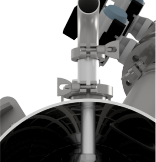 Close-up view of an industrial processing machine, showcasing the internal pipe connections and secure clamps for material flow and processing.